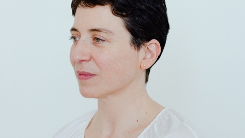 A photo of writer Lucy Ives, a side profile